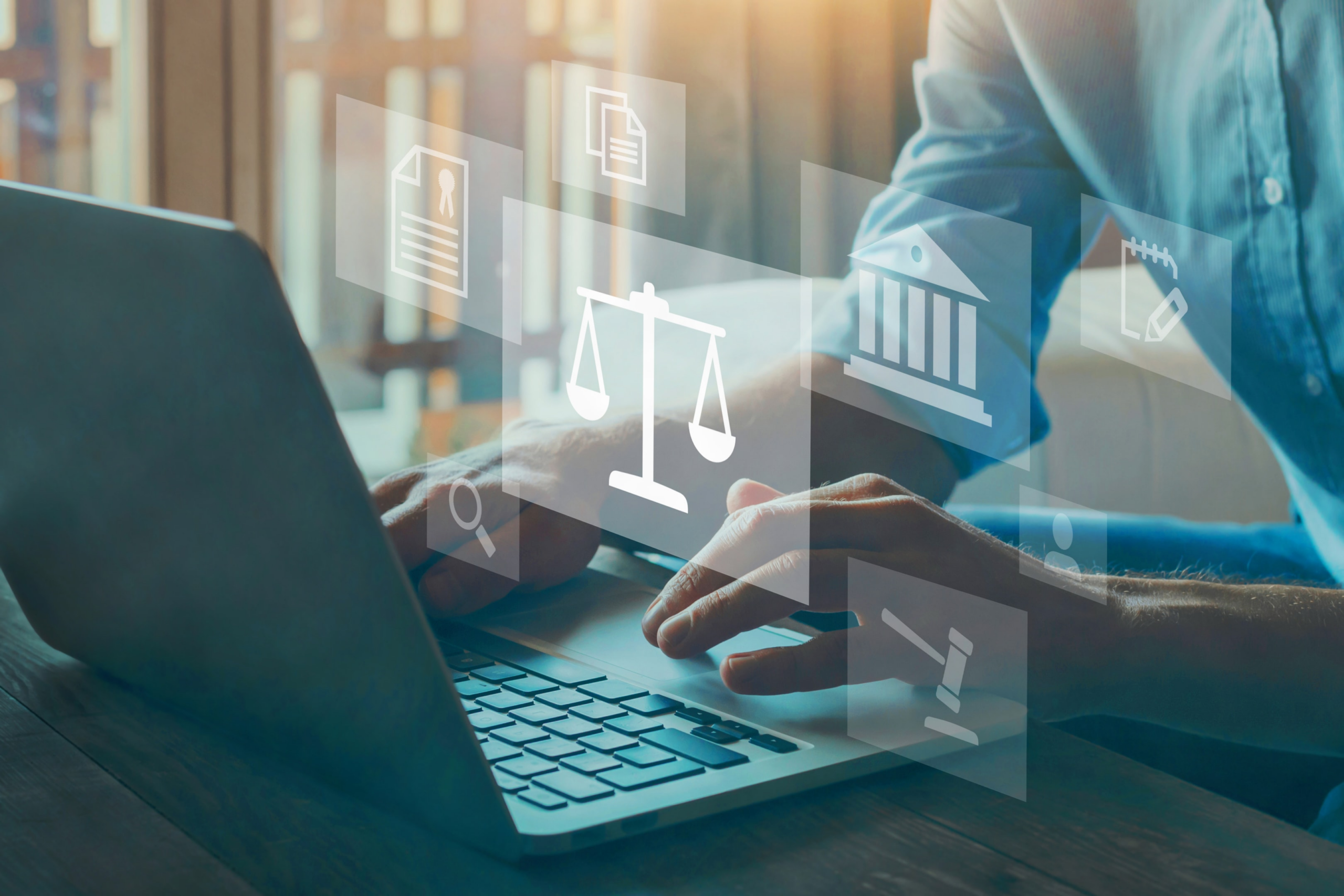 tech layoff - male lawyer using a computer - Hershey Law