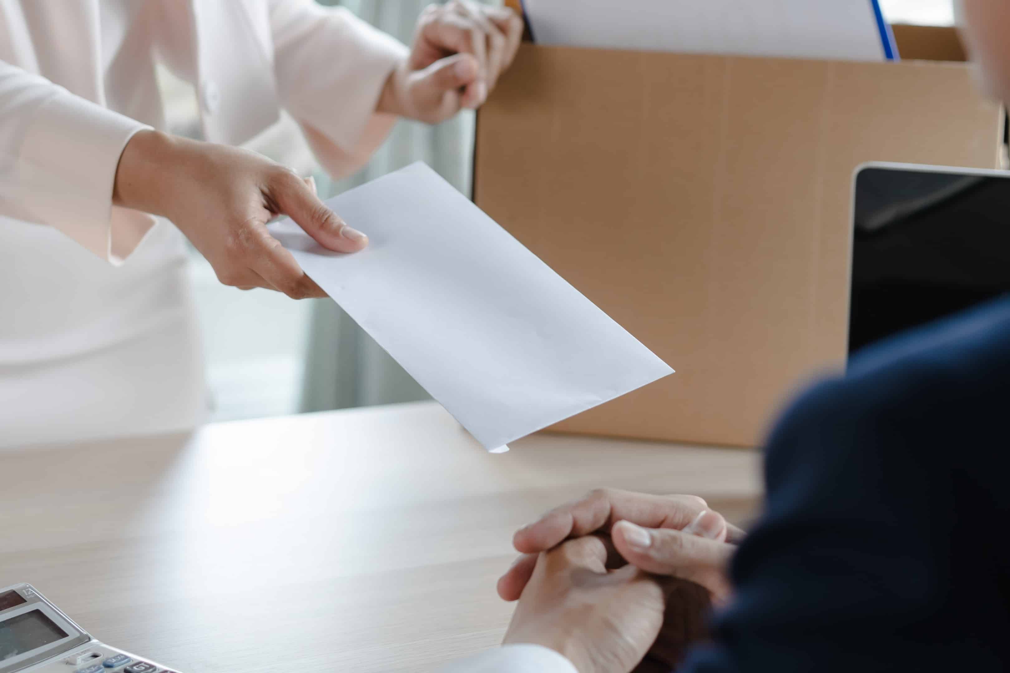 wrongful termination lawyer - document been handed - Hershey Law