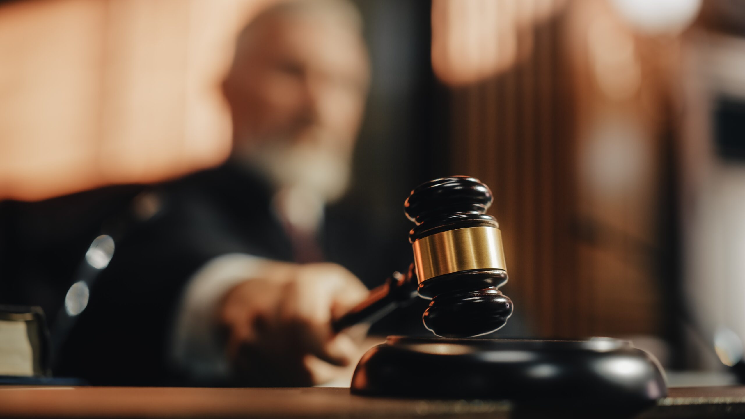 The Difference Between Ethical and Legal Implications Explained - judge in California with a gavel