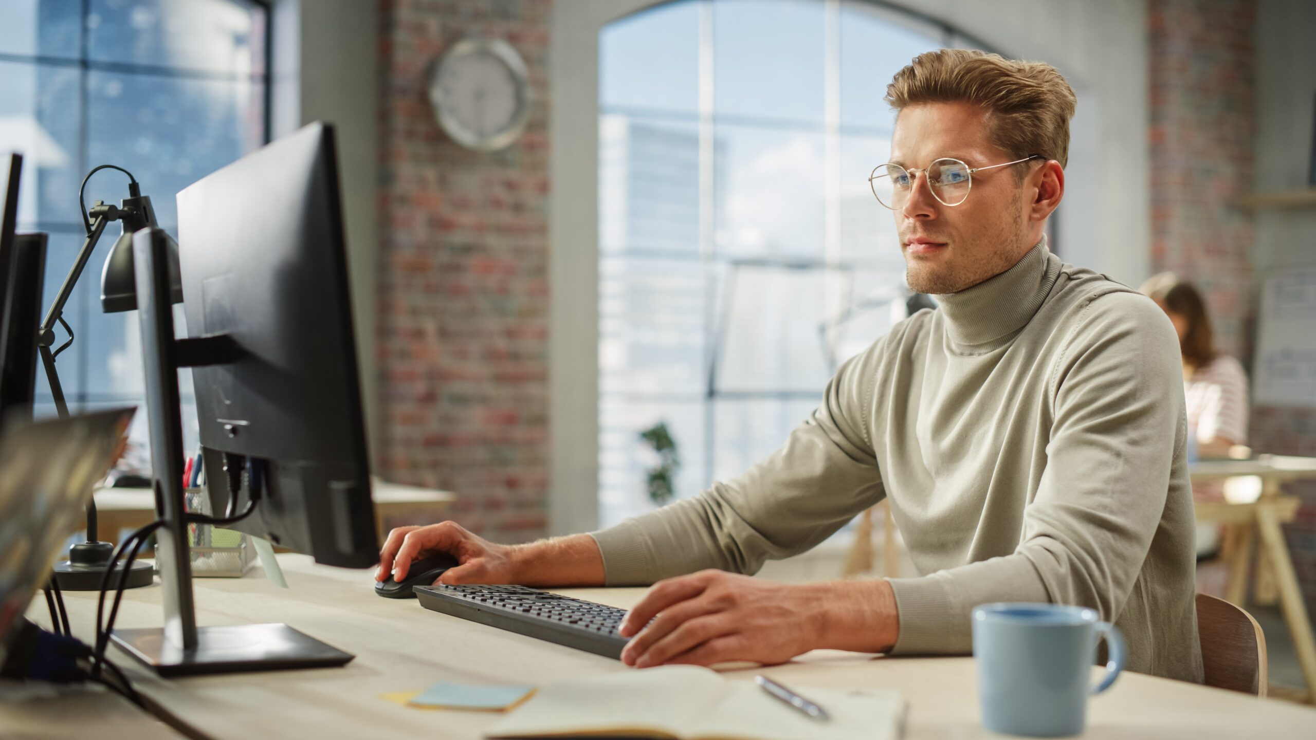 A professional at work writing a complaint to HR